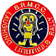 Laughing Lightbulb motorcycle rally badge from Jean-Francois Helias