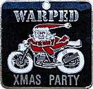 Warped Xmas Party motorcycle rally badge from Jean-Francois Helias